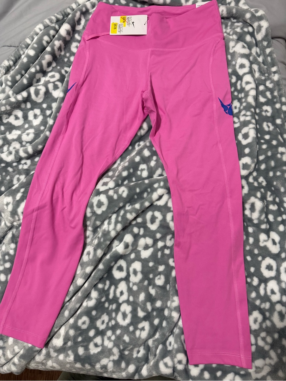 Nike women ' Hot Pink Leggings with Blue Swoosh
